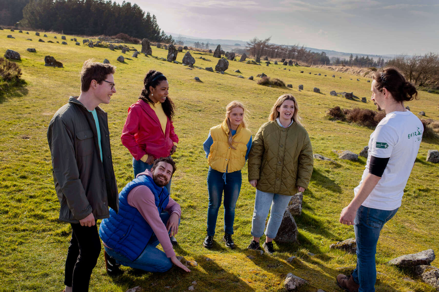 Visitors learning about Beaghmore Stones as part of thier Embrace Tours experience