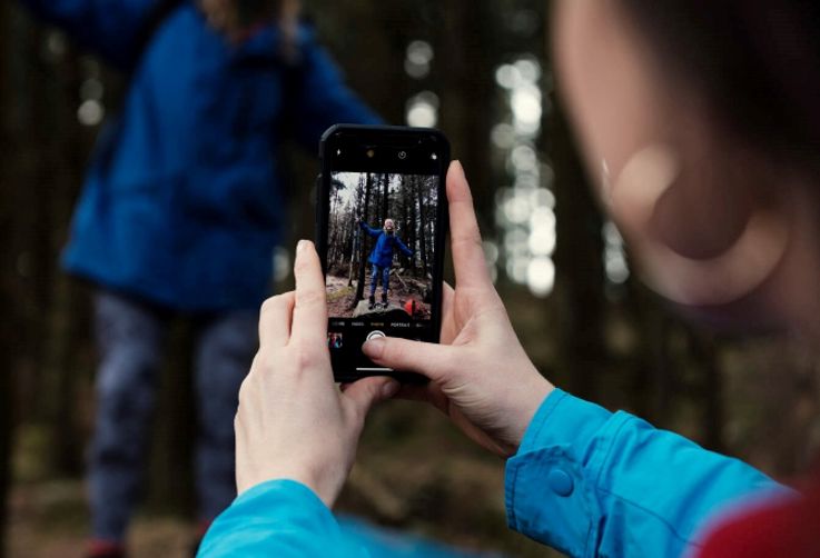 Taking a picture with a mobile phone of Hiking friends in the Mourne Mountains