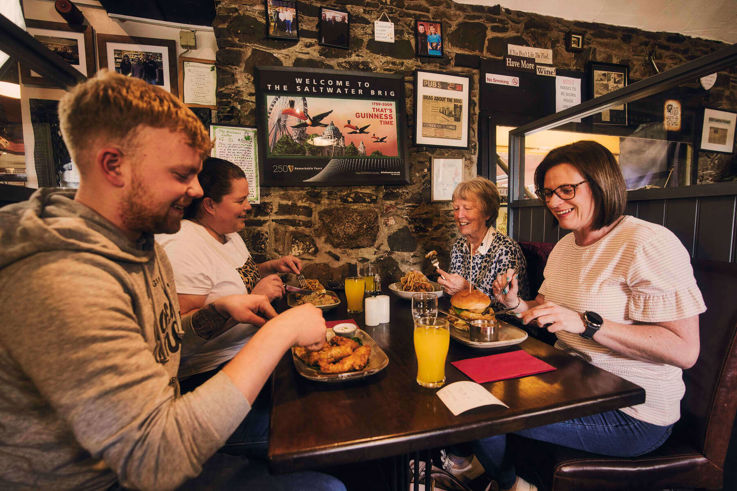 Customers eating in the Saltwater Brig Bar & Restaurant