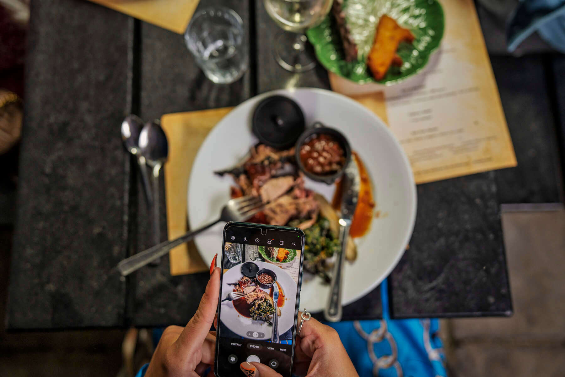 Customer taking pinterest photo of their meal