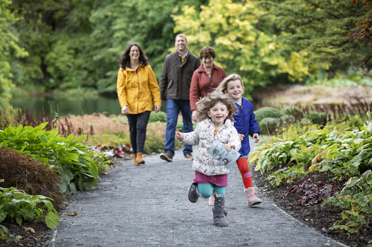  Family enjoying a stroll around the gardens at Montalto Estate.